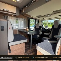 Weinsberg 700MEG CaraCore 9T-Automaat Enkele Bedden Hefbed Luifel Fietsenrek Foto #1