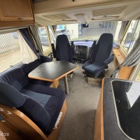 Hymer B574 – Ruime integraalcamper met vast bed én riant hefbed Foto #10