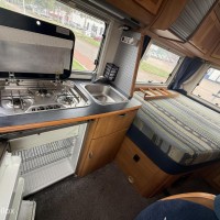 Hymer B574 – Ruime integraalcamper met vast bed én riant hefbed Foto #11