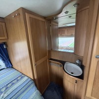 Hymer B574 – Ruime integraalcamper met vast bed én riant hefbed Foto #13