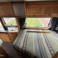 Hymer B574 – Ruime integraalcamper met vast bed én riant hefbed Foto #14
