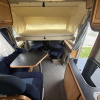 Hymer B574 – Ruime integraalcamper met vast bed én riant hefbed Foto #15