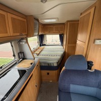 Hymer B574 – Ruime integraalcamper met vast bed én riant hefbed Foto #16